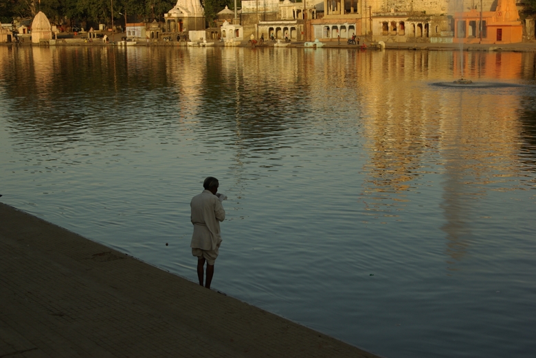 Man on the edge of river