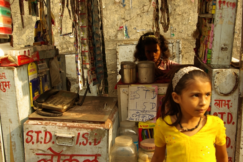 Indian seller girl in the shadow