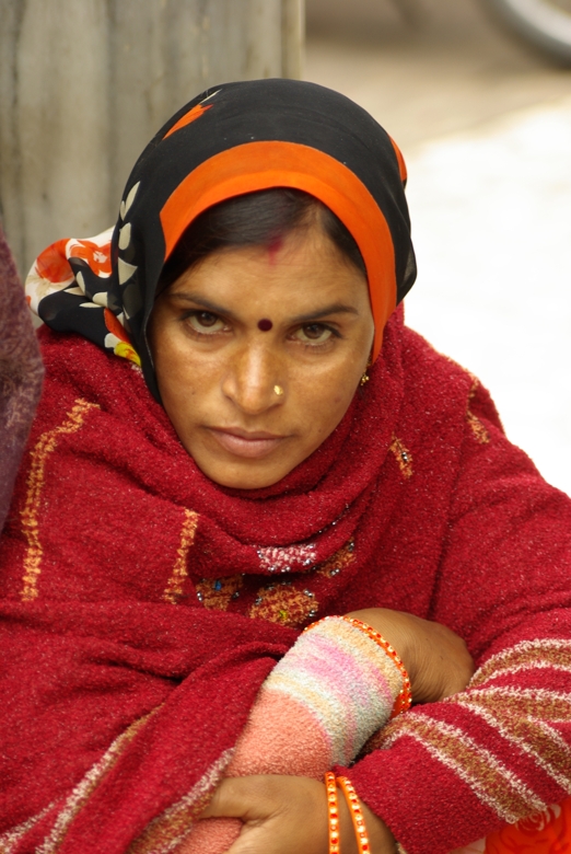 Woman with red scarf