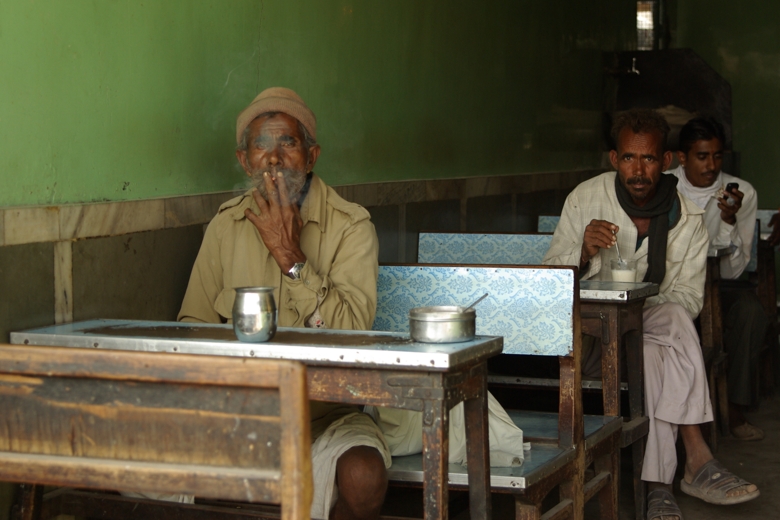 Indian coffee with green wall