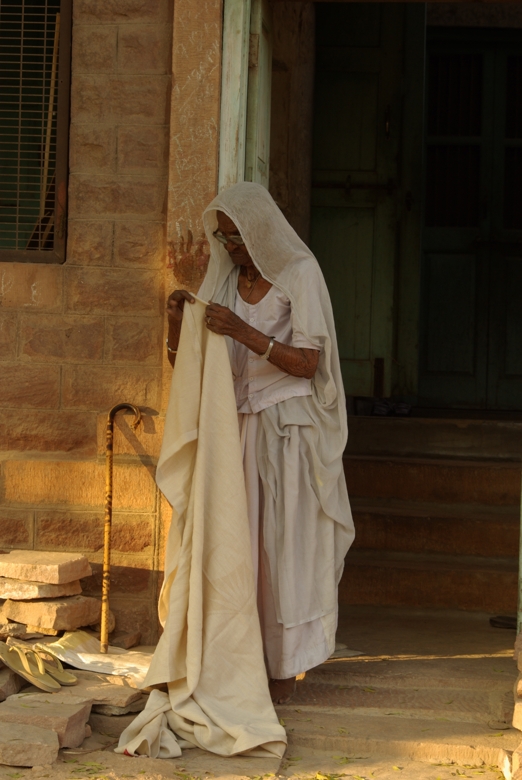 old woman with white fabric