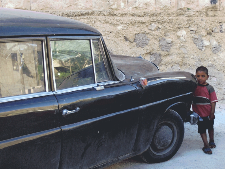 Black car and child