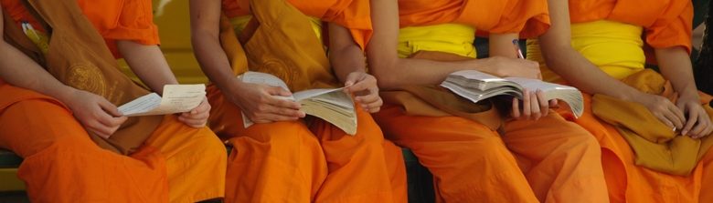 Thai monks reading book